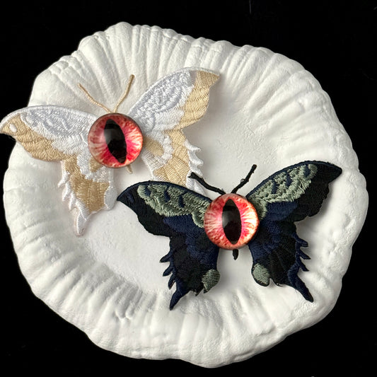 MYSTICAL BUTTERFLY HAIR CLIP WITH DEVIL EYEBALL DESIGN